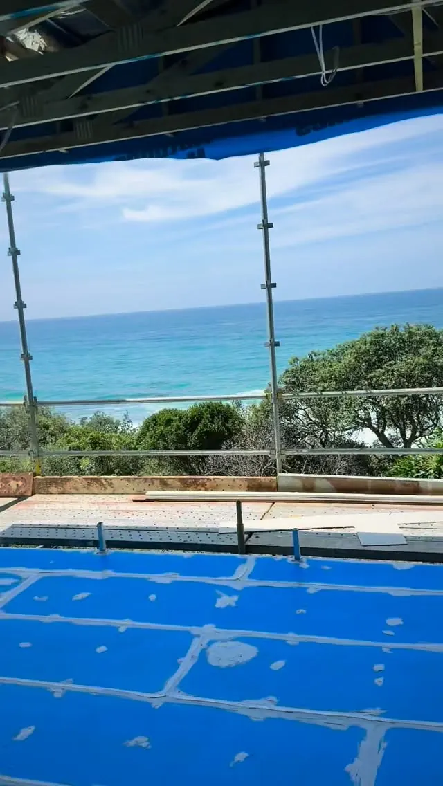 Ocean-view balcony at Ulladulla with blue primed panels and grey joint sealant