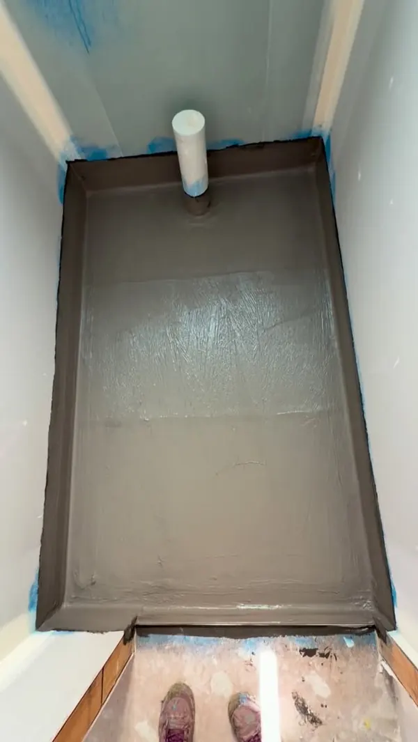 Upstairs WC waterproofed in grey membrane with bond breakers, ready for inspection